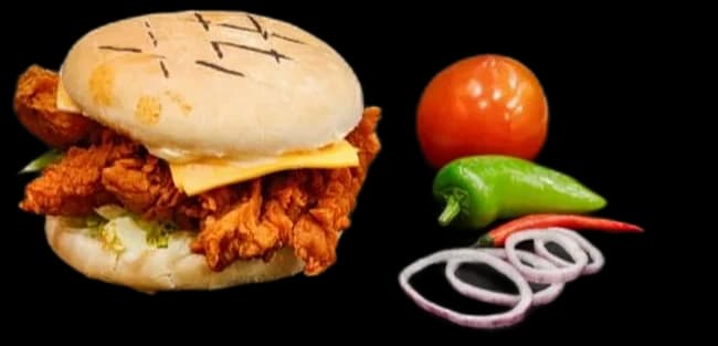 Peri chicken burger with tomato, chillies and onion