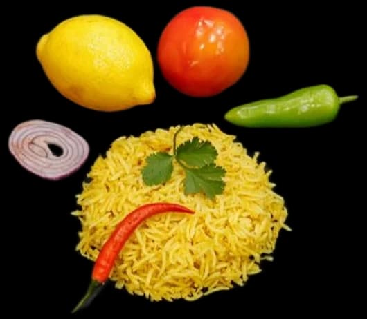 Spicy rice with lemon, tomato and green chilli